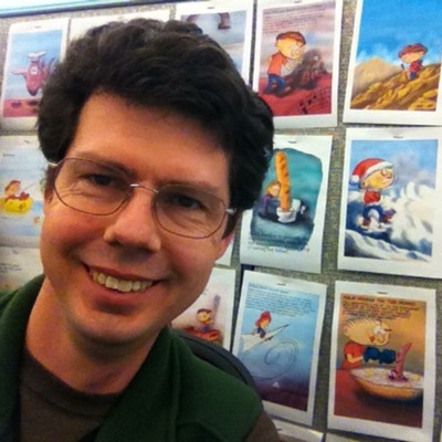 Photo of map maker, programmer, and cartoonist Philip Riggs.